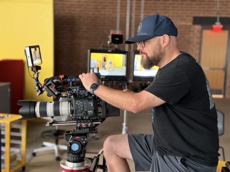 Camera operator framing a shot on a Canon C500